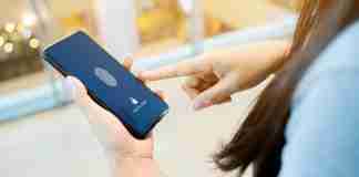 Android Phone Fingerprint Sensor used by woman