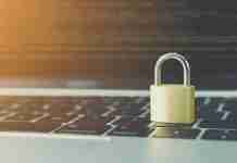Antivirus image with lock on laptop