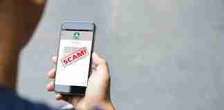 Scam email alert on phone