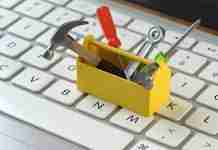 Remove Smartwebfinder.com Search Redirect – use these EASY steps! (2025) Toolkit on laptop keyboard to fix virus