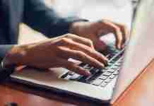 Remove Toksearches.xyz Search Redirect – the EASY way! (2025) Working on laptop in office