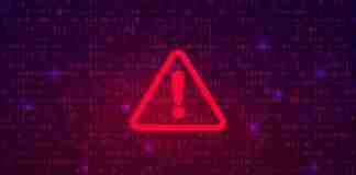 Cybercrime warning sign on binary background