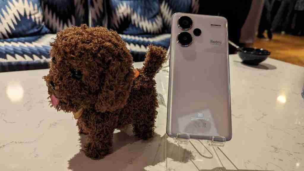 Redmi Note 13 Pro+ 5G with Dog